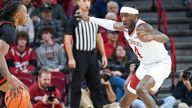 Razorbacks' Davonte Davis on defense against Gardner-Webb